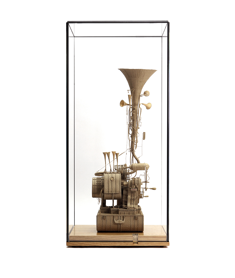 Daniel Agdag, Machine / Instrument No. 3 2018<br> Cardboard, paper, brass, nickel, 11 jewel Hermle carriage movement. Mounted on wooden base (Victorian Ash) under low iron glass<br>65cm x 30.5cm x 30.5cm (including glass vitrine)